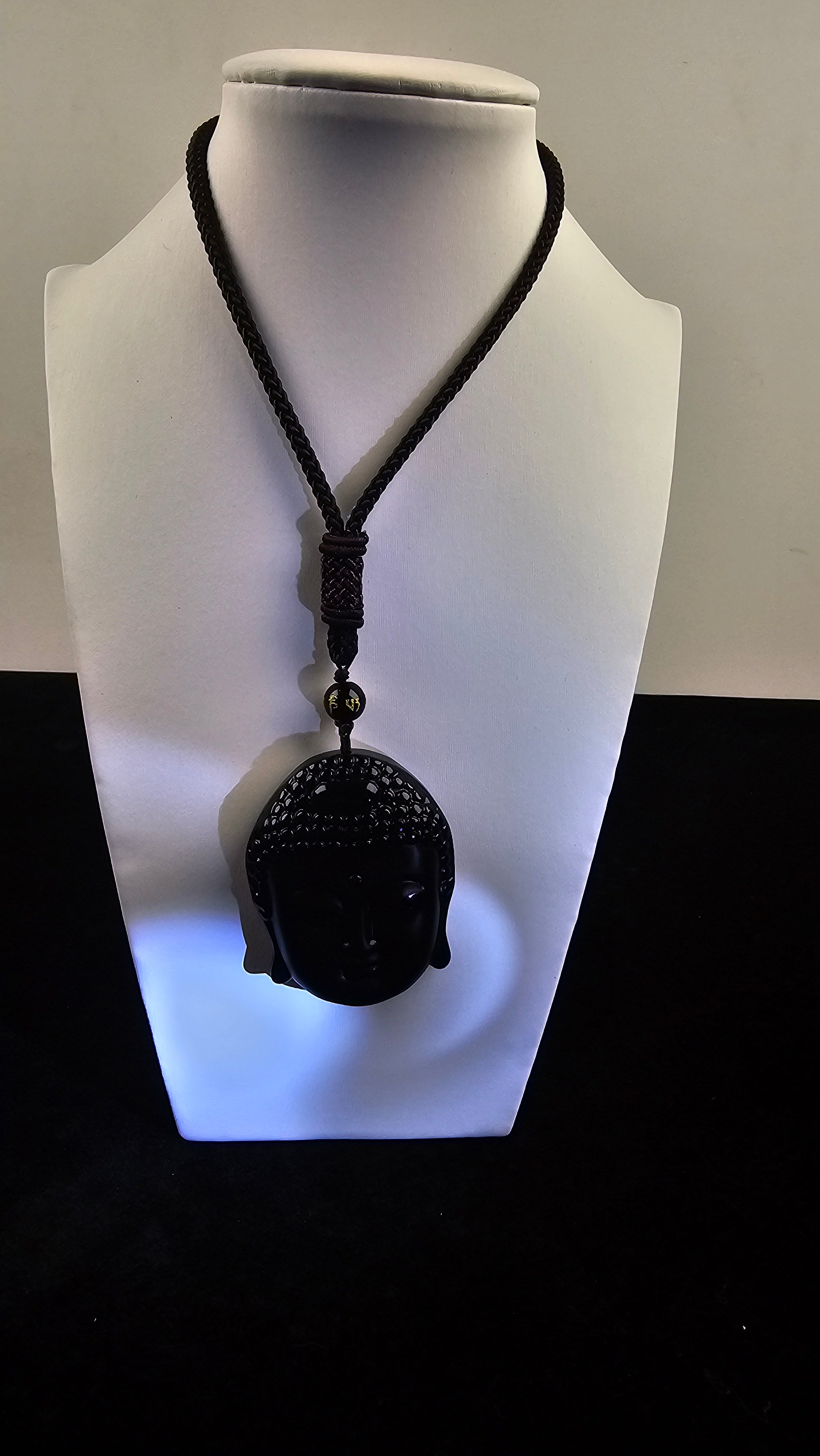 Obsidian Buddha Head Pendant Hand-carved crystal necklace symbolizing peace, mindfulness and protection.