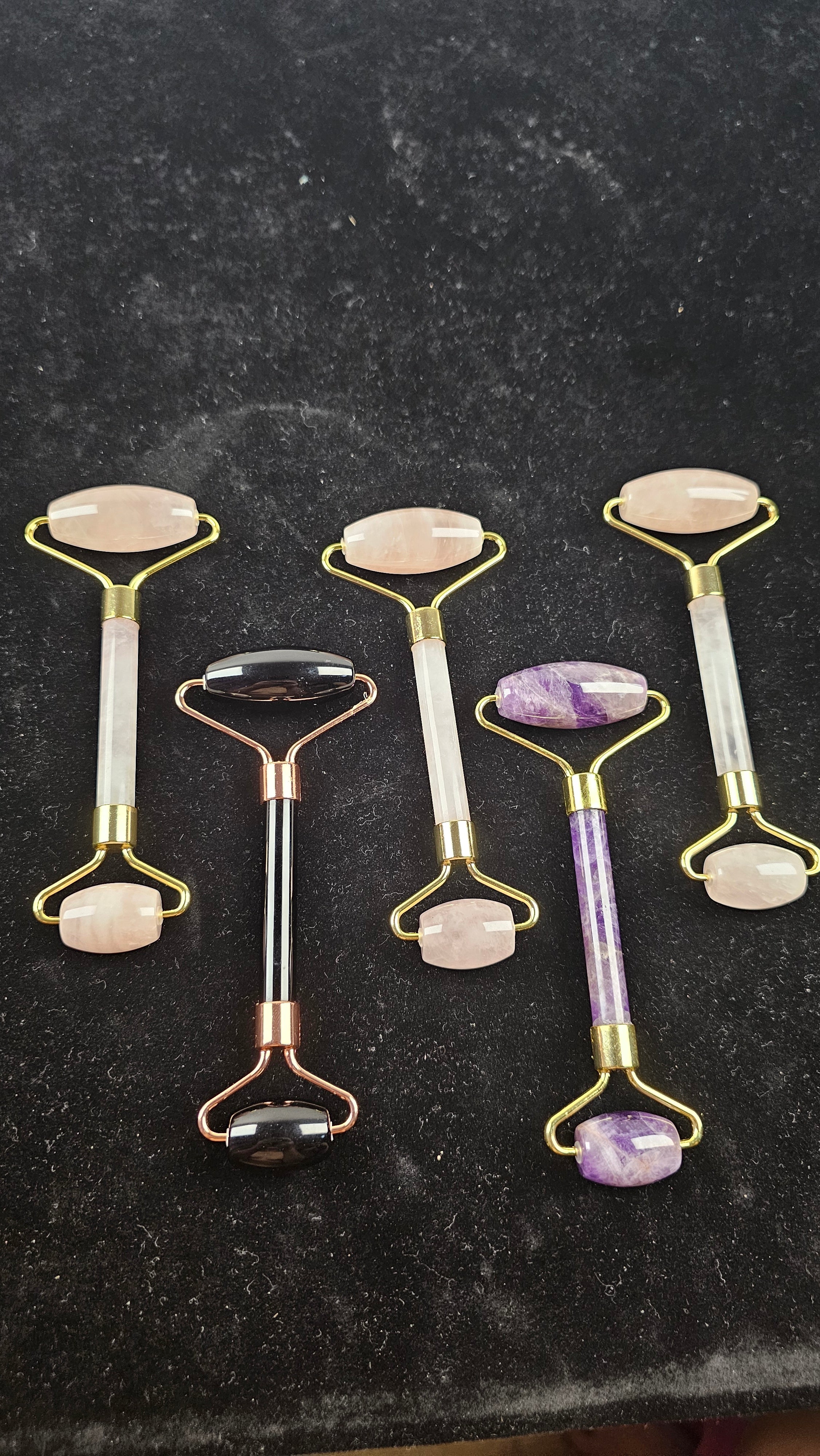 Crystal Facial Roller Massager in Rose Quartz, Obsidian & Amethyst. Dual-ended roller for skincare, puffiness relief, glowing skin & relaxation