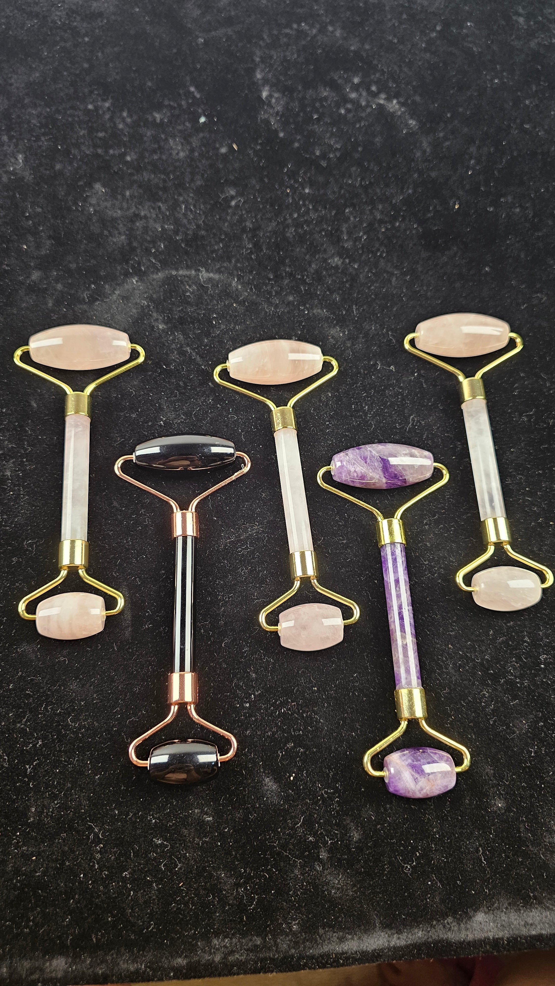 Crystal Facial Roller Massager in Rose Quartz, Obsidian & Amethyst. Dual-ended roller for skincare, puffiness relief, glowing skin & relaxation