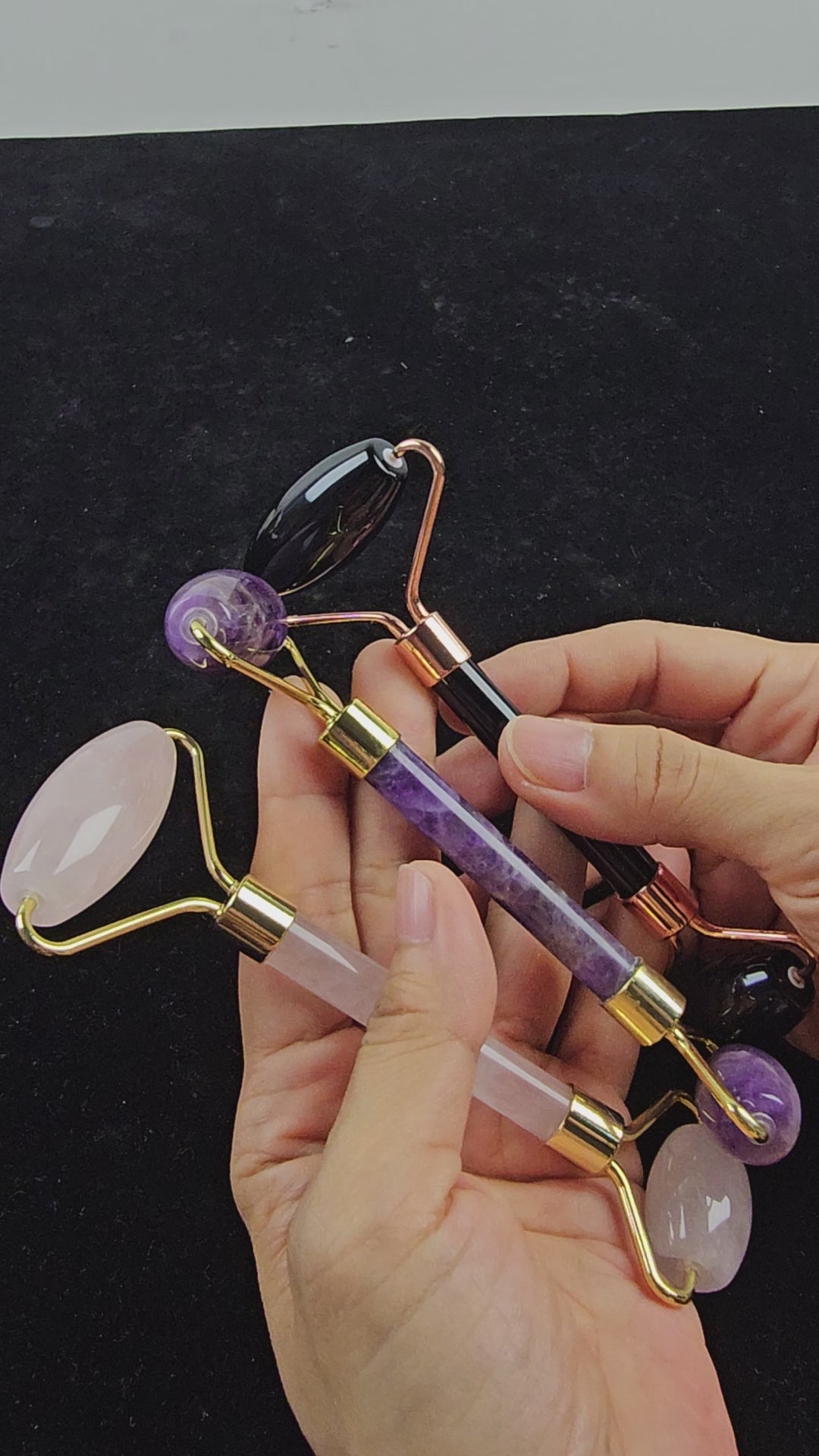 Crystal Facial Roller Massager in Rose Quartz, Obsidian & Amethyst. Dual-ended roller for skincare, puffiness relief, glowing skin & relaxation